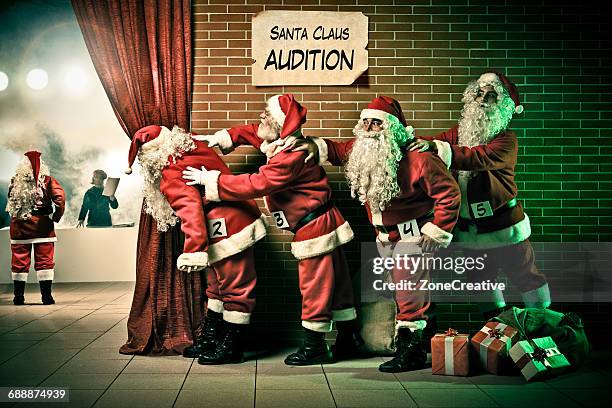 curious santa claus in line for a theater audition - casting call stockfoto's en -beelden