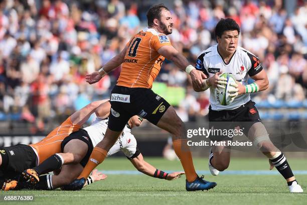 Harumichi Tatekawa of the Sunwolves takes on the defence during the Super Rugby Rd 14 match between Sunwolves and Cheetahs at Prince Chichibu...