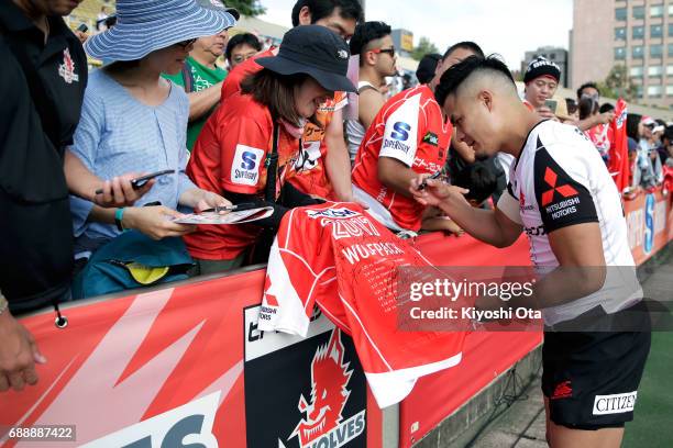 Yu Tamura of the Sunwolves signs autographs for fans after the Super Rugby Rd 14 match between Sunwolves and Cheetahs at Prince Chichibu Memorial...