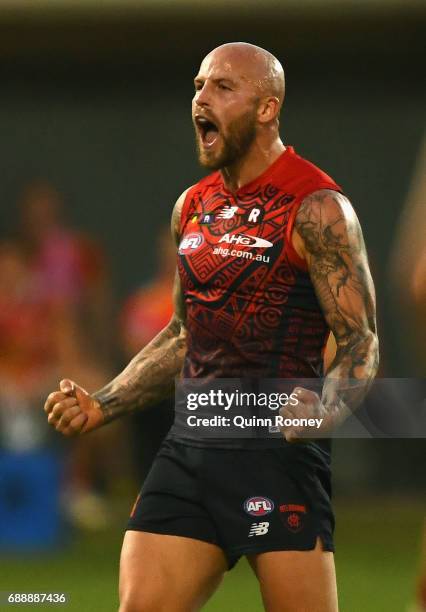 Nathan Jones of the Demons celebrates kicking a goal during the round ten AFL match between the Melbourne Demons and the Gold Coast Suns at Traeger...