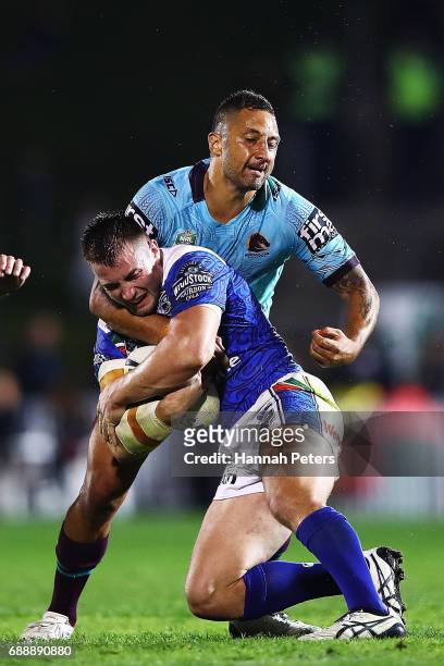 Benji Marshall of the Broncos tackles Kieran Foran of the Warriors during the round 12 NRL match between the New Zealand Warriors and the Brisbane...