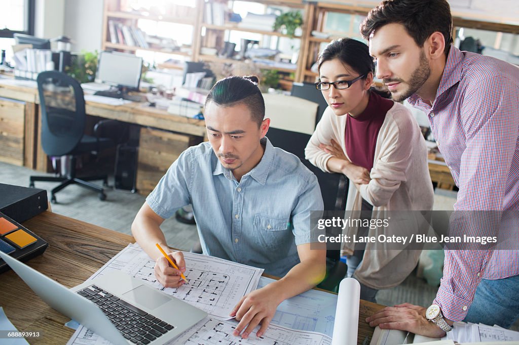 Architects working together in the office