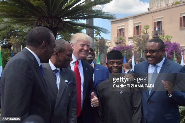 President Donald Trump poses with Kenya's President Uhuru Kenyatta , Guinea's President Alpha Conde , Vice President of Nigeria Yemi Osinbajo and...