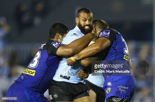 Jayson Bukuya of the Sharks is tackled during the round 12 NRL match between the Cronulla Sharks and the Canterbury Bulldogs at Southern Cross Group...