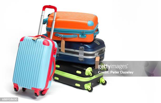 still life of suitcases - suitcase stock pictures, royalty-free photos & images