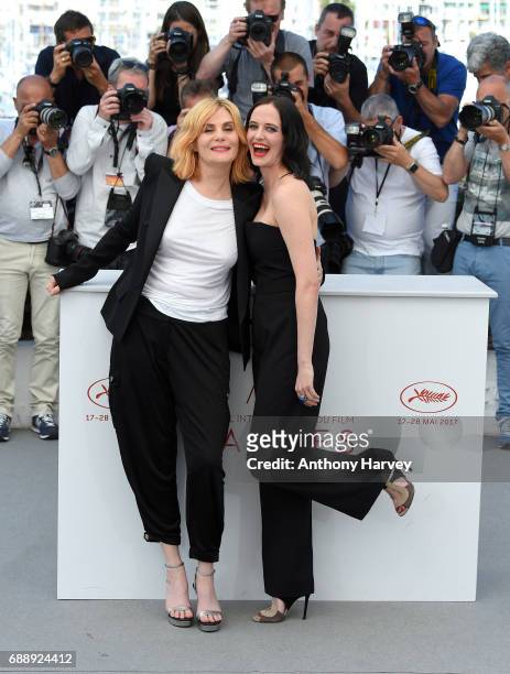 Eva Green and Emmanuelle Seigner attend the "Based On A True Story" Photocall during the 70th annual Cannes Film Festival at Palais des Festivals on...