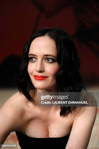 French actress Eva Green signs autographs on May 27, 2017 after attending a press conference for the film 'Based on a True Story' at the 70th edition...