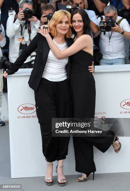 Eva Green and Emmanuelle Seigner attend the "Based On A True Story" Photocall during the 70th annual Cannes Film Festival at Palais des Festivals on...