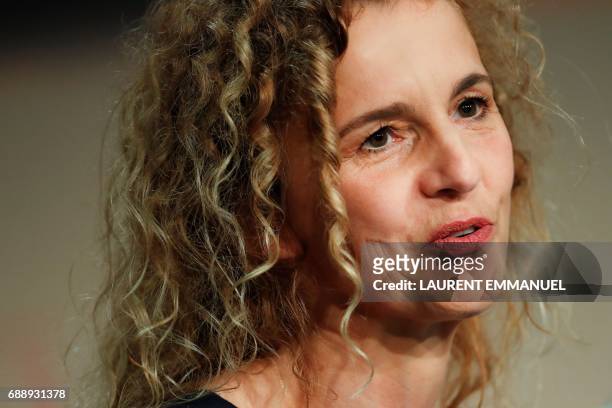 French writer Delphine De Vigan talks on May 27, 2017 during a press conference for the film 'Based on a True Story' at the 70th edition of the...
