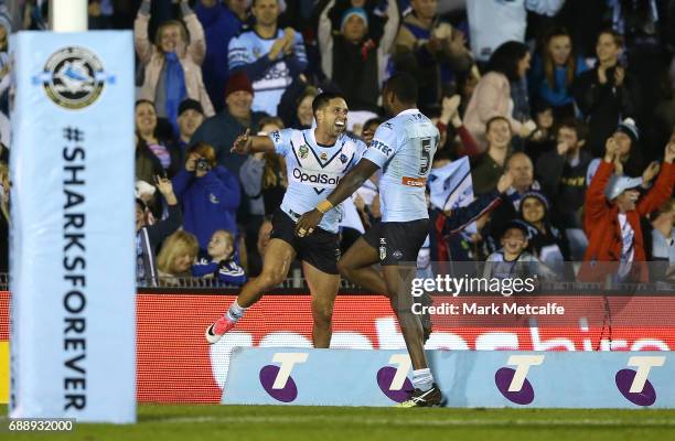 Gerard Beale of the Sharks celebrates scoring a try during the round 12 NRL match between the Cronulla Sharks and the Canterbury Bulldogs at Southern...