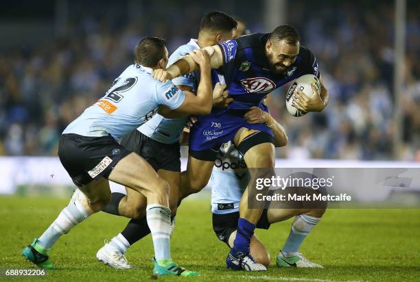 Sam Kasiano of the Bulldogs is tackled during the round 12 NRL match between the Cronulla Sharks and the Canterbury Bulldogs at Southern Cross Group...