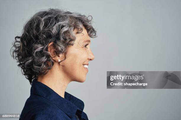 choosing the happier side of life - side view stock pictures, royalty-free photos & images