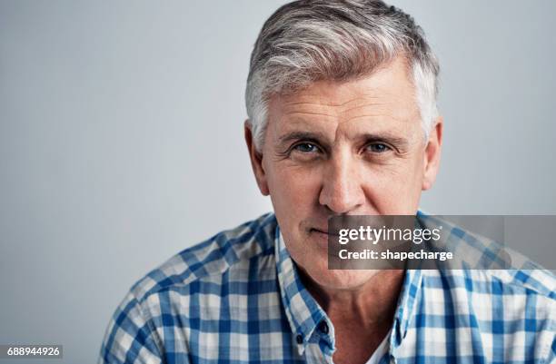 facing whatever comes my way - grey hair male stock pictures, royalty-free photos & images