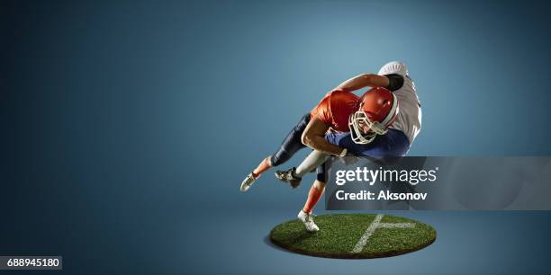 american football in action - football player tackle stock pictures, royalty-free photos & images