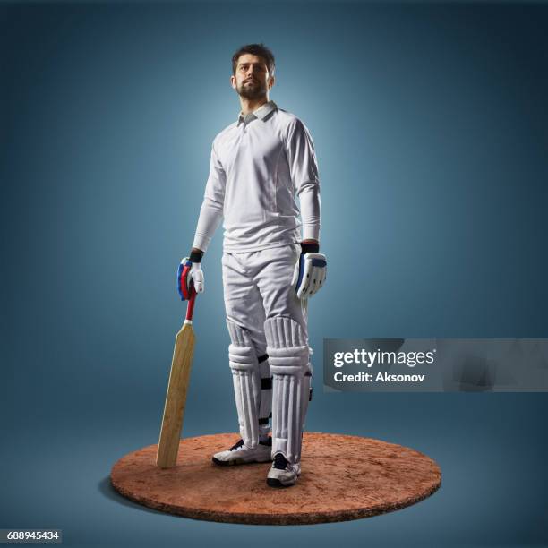 cricket speler in actie - cricket player stockfoto's en -beelden