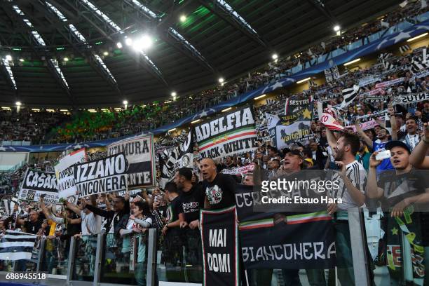 Juventus supporters cheer prior to the UEFA Champions League Semi Final second leg match between Juventus and AS Monaco at Juventus Stadium on May 9,...