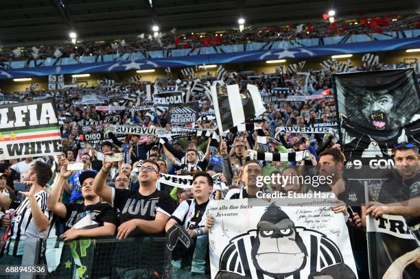 Juventus supporters cheer prior to the UEFA Champions League Semi Final second leg match between Juventus and AS Monaco at Juventus Stadium on May 9,...