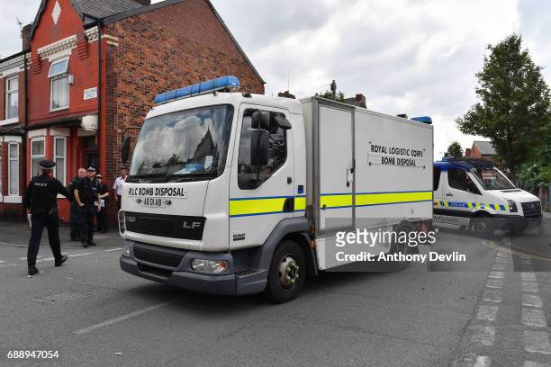 Bomb disposal team attends the scene of a raid in the Moss Side area as part of the ongoing police investigation following the terror attack earlier...