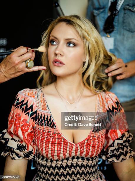 Camilla Kerslake wearing Moy Atelier sunglases poses at Nikki Beach during the 70th Annual Cannes Film Festival on May 26, 2017 in Cannes, France.