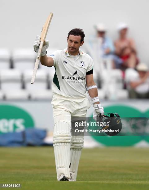 Daryl Mitchell of Worcestershire celebrates his century during the Specsavers County Championship division two match between Northamptonshire and...
