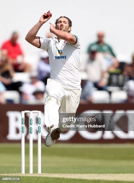 Steven Crook of Northamptonshire bowls during the Specsavers County Championship division two match between Northamptonshire and Worcestershire at...