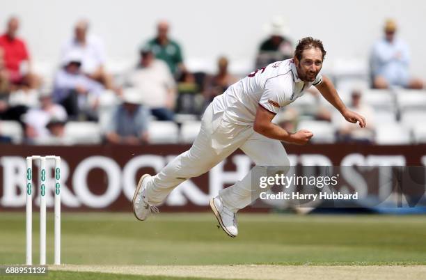 Steven Crook of Northamptonshire bowls during the Specsavers County Championship division two match between Northamptonshire and Worcestershire at...