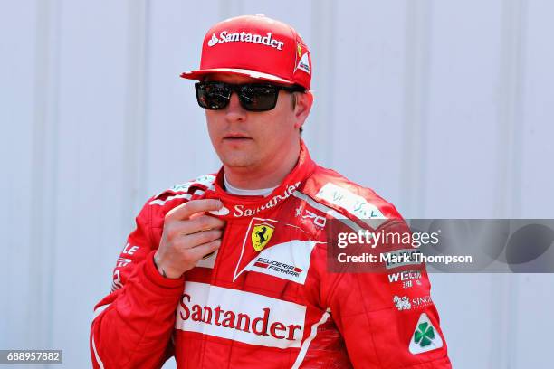 Pole position qualifier Kimi Raikkonen of Finland and Ferrari in parc ferme during qualifying for the Monaco Formula One Grand Prix at Circuit de...