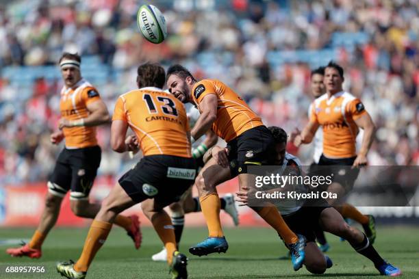 Niel Marais of the Cheetahs is tackled by Derek Carpenter of the Sunwolves during the Super Rugby Rd 14 match between Sunwolves and Cheetahs at...