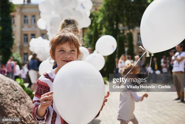 Ukrainians dressed in vyshyvankas with traditional embroideries attend the 'March in vyshyvankas' in downtown on May 28, 2017 in Kiev, Ukraine.