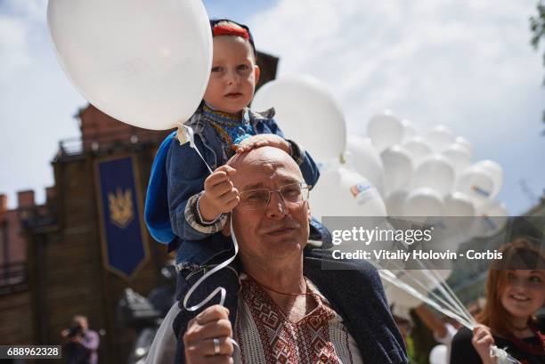 Ukrainians dressed in vyshyvankas with traditional embroideries attend the 'March in vyshyvankas' in downtown on May 28, 2017 in Kiev, Ukraine.