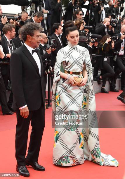 Gabriel Yared and Fan Bingbing attend 'Amant Double ' Red Carpet Arrivals during the 70th annual Cannes Film Festival at Palais des Festivals on May...