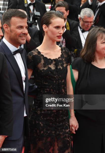 Marine Vacth and director Francois Ozon attend 'Amant Double ' Red Carpet Arrivals during the 70th annual Cannes Film Festival at Palais des...