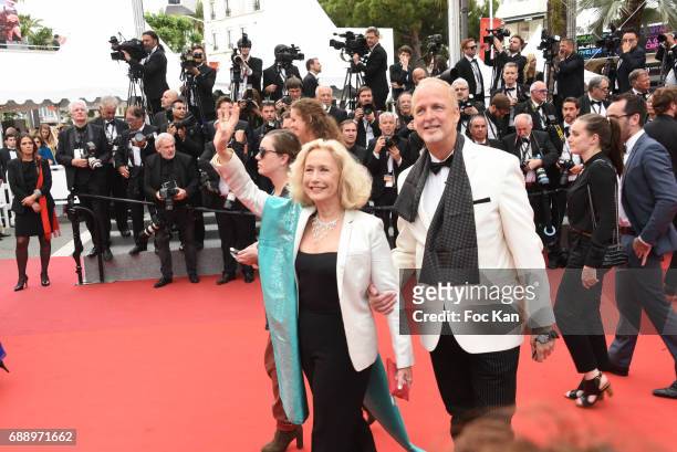 Brigitte Fossey and Larry Cech attend 'Amant Double ' Red Carpet Arrivals during the 70th annual Cannes Film Festival at Palais des Festivals on May...