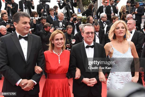 Sandrine Bonnaire and guests attend 'Amant Double ' Red Carpet Arrivals during the 70th annual Cannes Film Festival at Palais des Festivals on May...