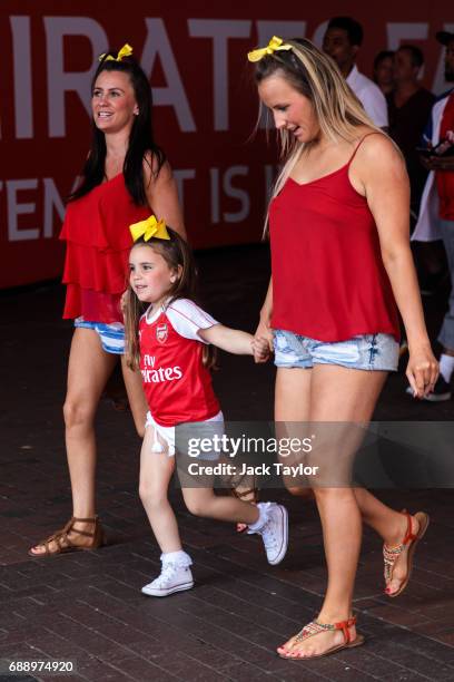 Football fans arrive at Wembley Park Tube Station ahead of the FA Cup final on May 27, 2017 in London, England. Football fans will watch Arsenal play...