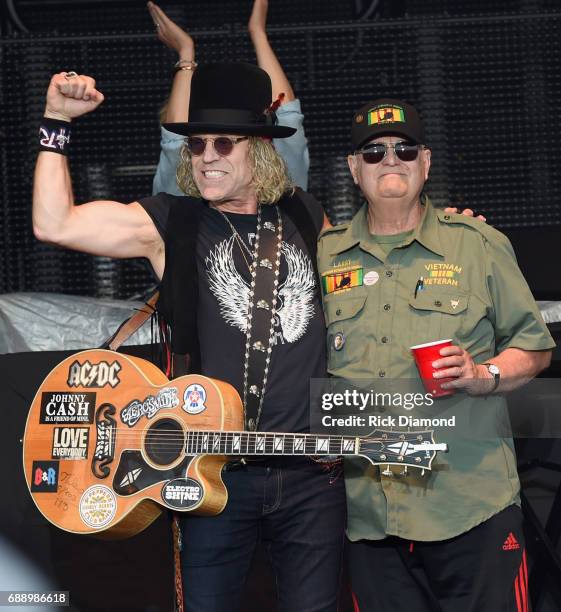 Big Kenny and John Rich of Big and Rich honor Viet Nam War Veteran Larry Paul by performing "8th. Of November" during Tree Town Music Festival - Day...