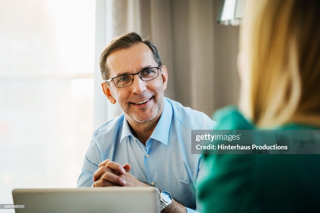 Businessman Impressed With Colleagues Ideas