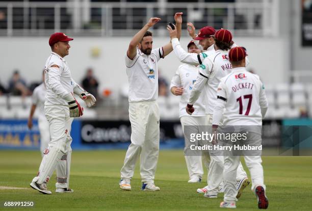 Northamptonshire celebrate the wicket of Tom Kohler-Cadmore of Worcestershire during the Specsavers County Championship division two match between...