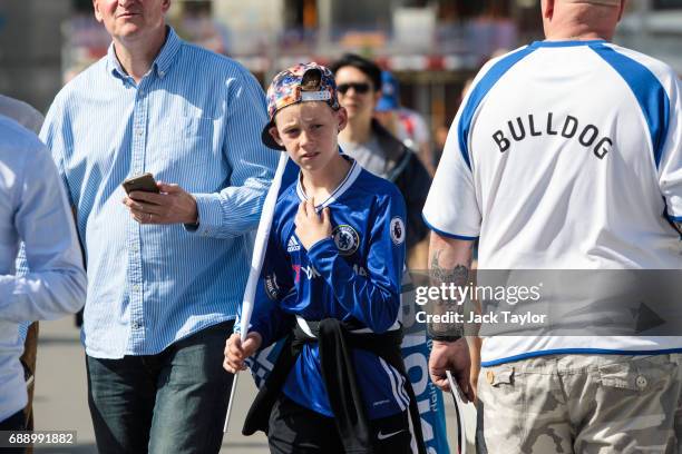 Young football fan makes his way to Wembley Stadium ahead of the FA Cup final on May 27, 2017 in London, England. Football fans will watch Arsenal...