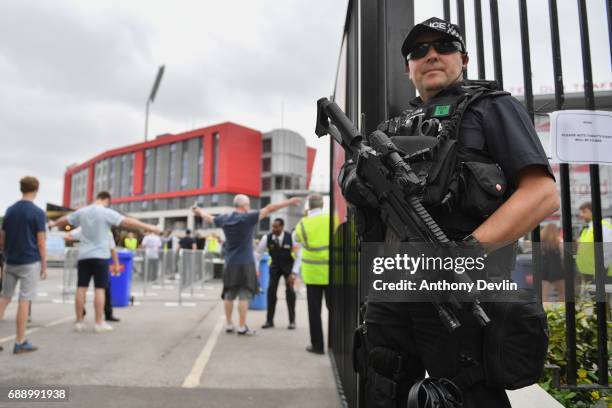 Armed police patrol around Old Trafford Cricket Ground ahead of a Courteeners concert this evening on May 27, 2017 in Manchester, England. Security...