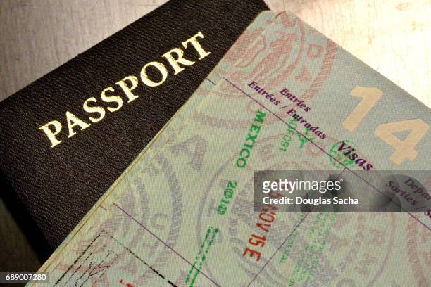 international passport documents - international organisation for migration stock pictures, royalty-free photos & images