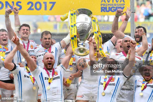 Jack Yeandle of Exeter Chiefs and Gareth Steenson of Exeter Chiefs lift The Aviva Premiership trophy after the Aviva Premiership Final between Wasps...