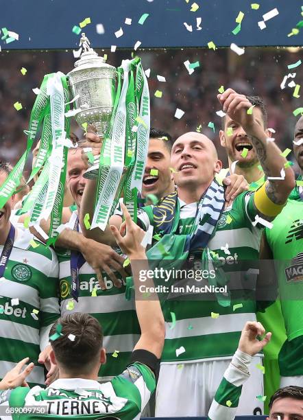 Scott Brown of Celtic lifts the trophy during the William Hill Scottish Cup Final between Celtic and Aberdeen at Hampden Park on May 27, 2017 in...