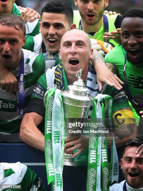 Scott Brown of Celtic lifts the trophy during the William Hill Scottish Cup Final between Celtic and Aberdeen at Hampden Park on May 27, 2017 in...