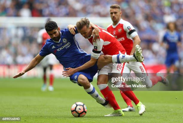 Diego Costa of Chelsea and Rob Holding of Arsenal challenge for the ball during The Emirates FA Cup Final between Arsenal and Chelsea at Wembley...