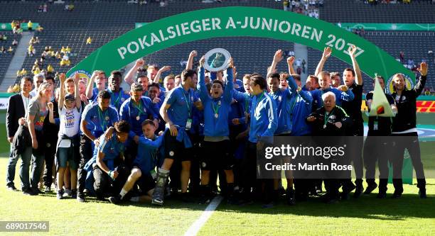 The team of Braunschweig celebrates winning the DFB Juniors Cup Final 2017 between Eintracht Braunschweig U19 and FC Carl Zeiss Jena U19 prior to the...