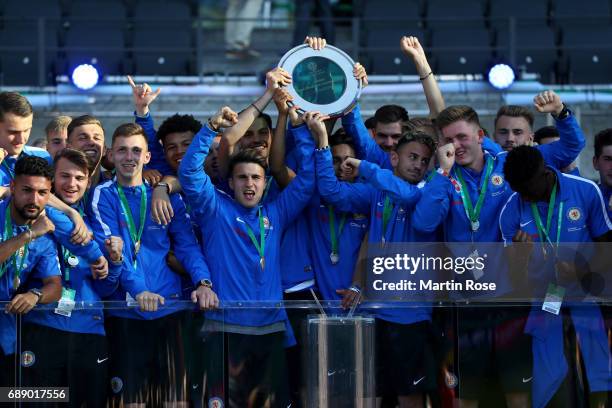 The team of Braunschweig celebrates winning the DFB Juniors Cup Final 2017 between Eintracht Braunschweig U19 and FC Carl Zeiss Jena U19 prior to the...