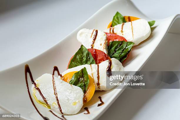 caprese salad - insalata stock-fotos und bilder