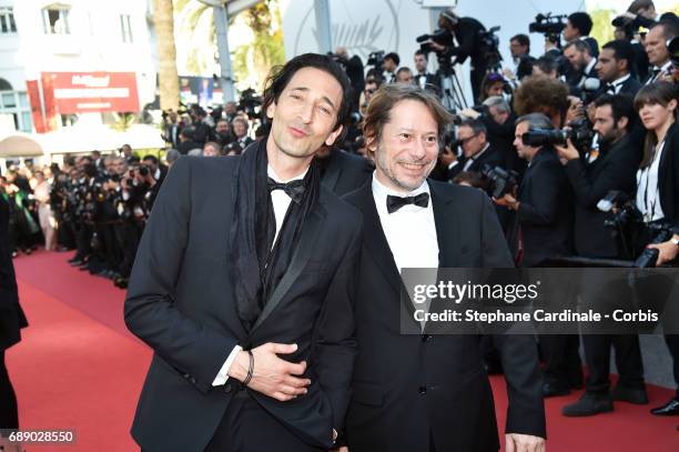 Adrien Brody and Mathieu Amalric attend the "Based On A True Story" screening during the 70th annual Cannes Film Festival at Palais des Festivals on...