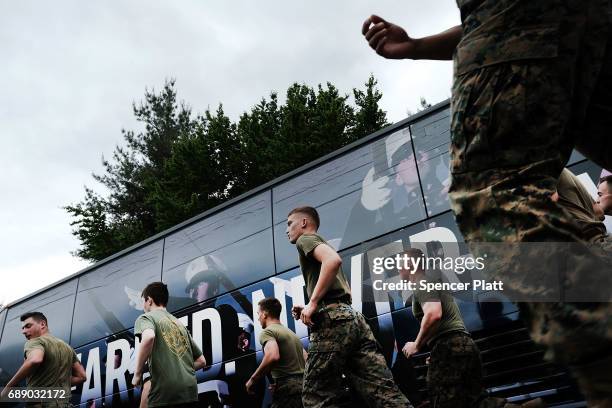 Members of the U.S. Marine Corps take a run in Brooklyn's Prospect Park as part of Fleet Week on May 27, 2017 in New York City. At "Marines Day" in...